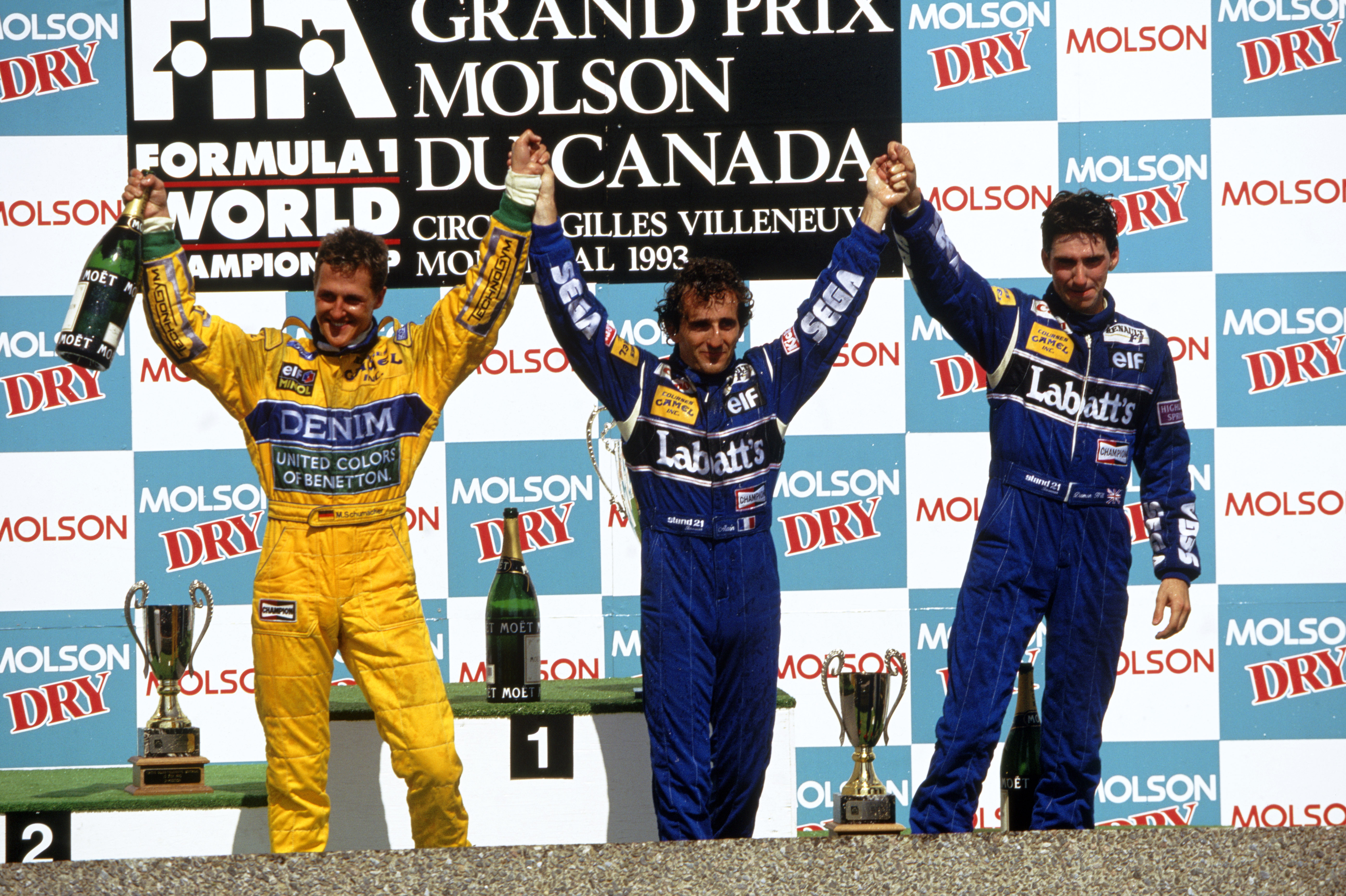 Prost ble vant med å stå øverst på seierspallen. Her har han slått Michael Schumacher og Damon Hill i Canada GP 1993. Foto: Williams