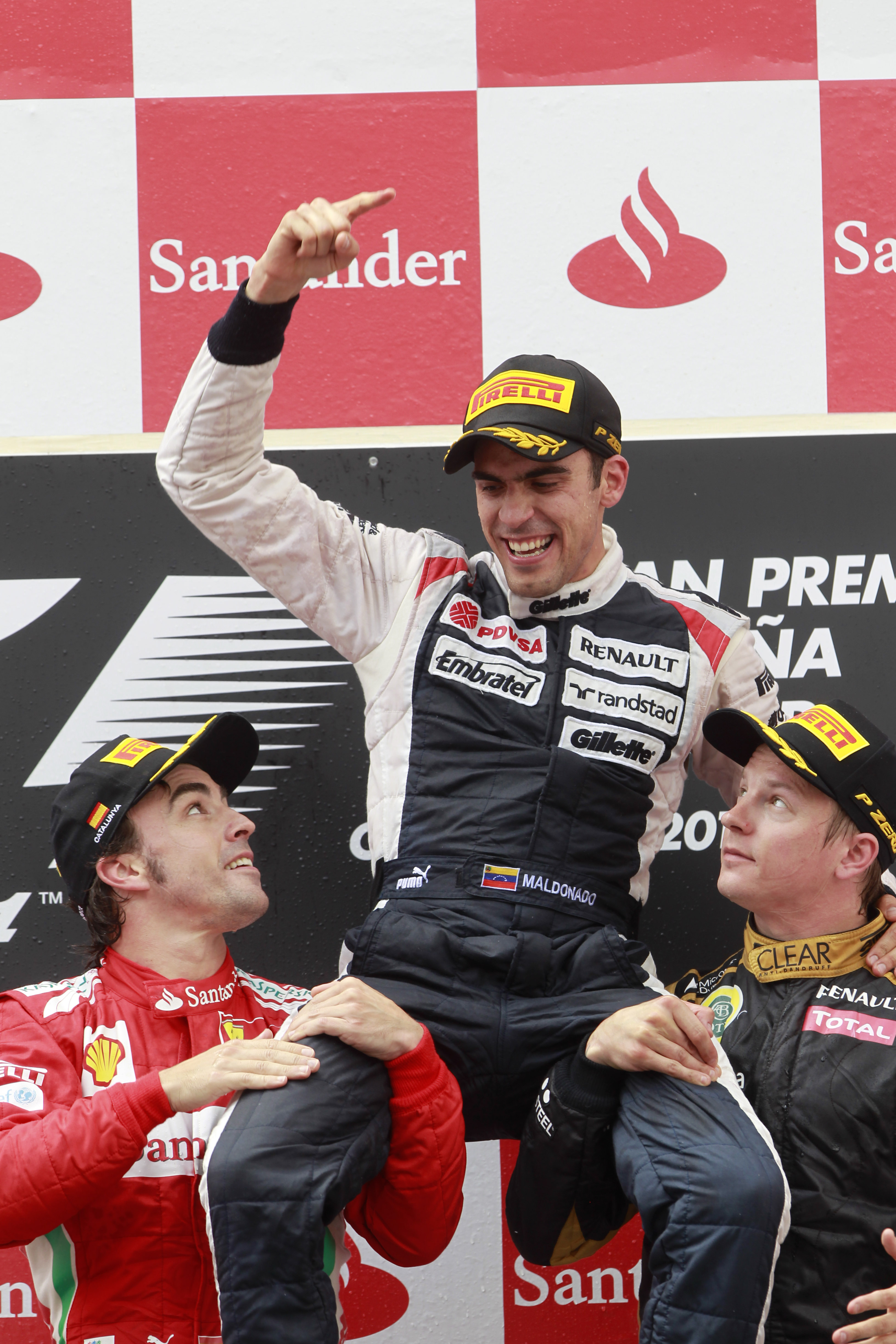Teamets siste seier kom i Spania GP 2012 med Pastor Maldonado bak rattet, her flankert av Alonso og Raikkonen på seierspallen.