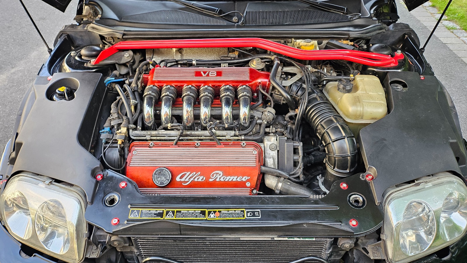 1998 Alfa Romeo 916 Spider Cab.