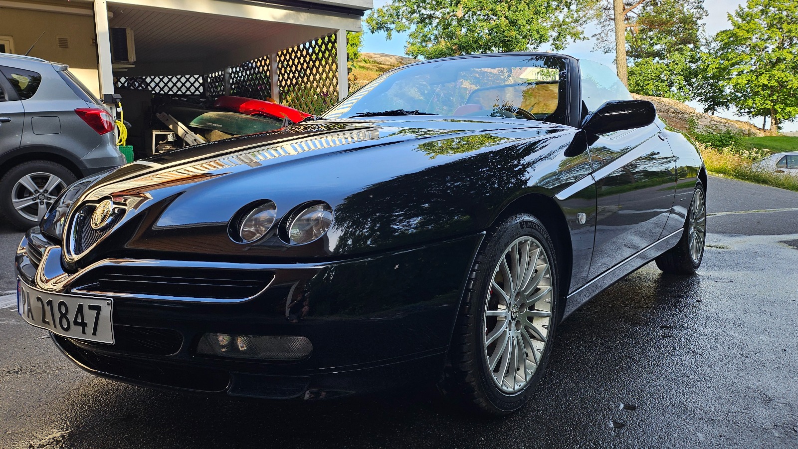 1998 Alfa Romeo 916 Spider Cab.